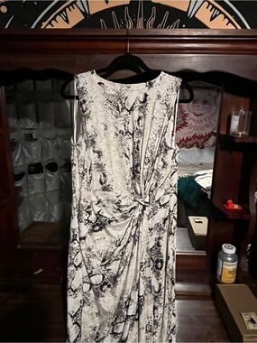 Nine Britton Snakeskin pattern flattering waist cinching Dress